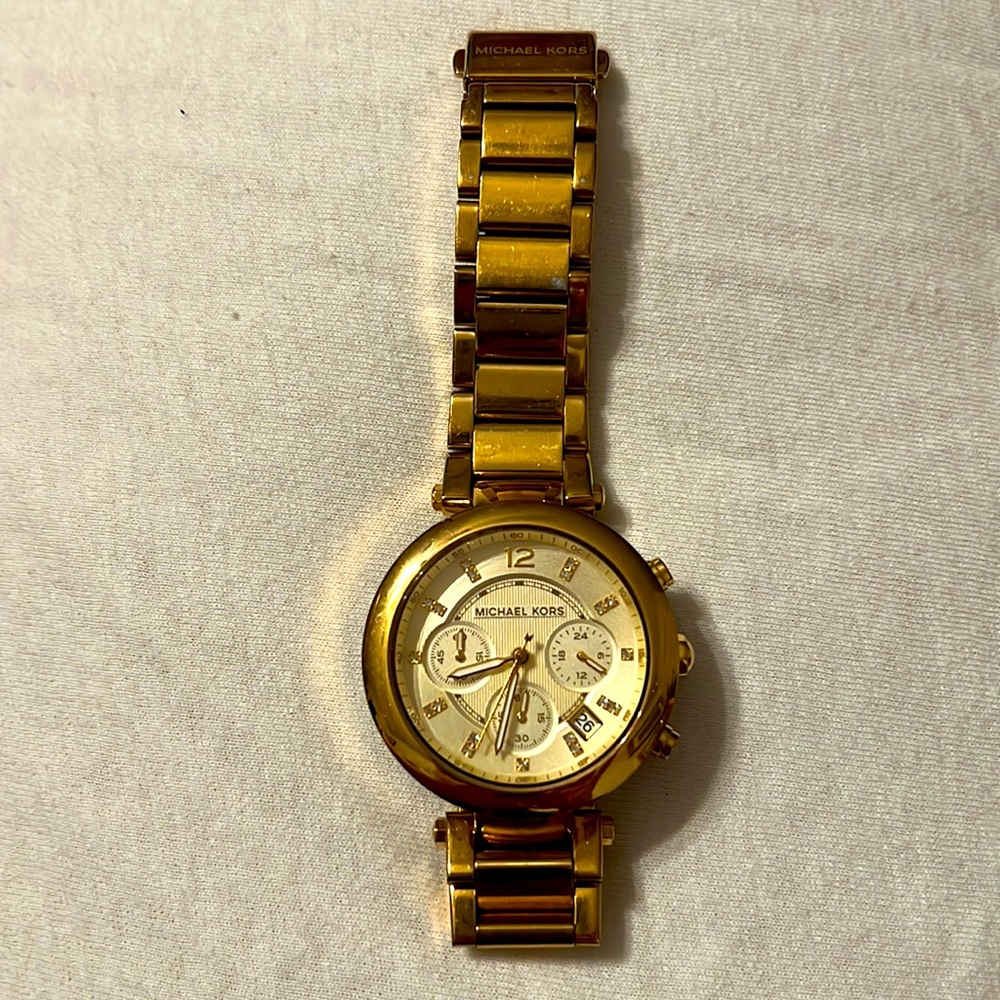 Michael Kors watch. Works good and has a new battery.